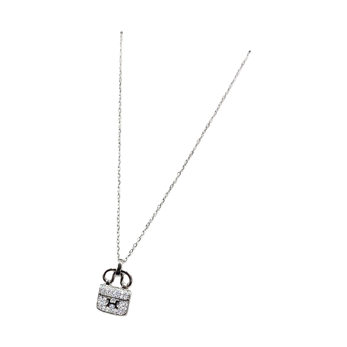 A silver chain necklace with a diamond-encrusted H-shaped handbag pendant Item Picture