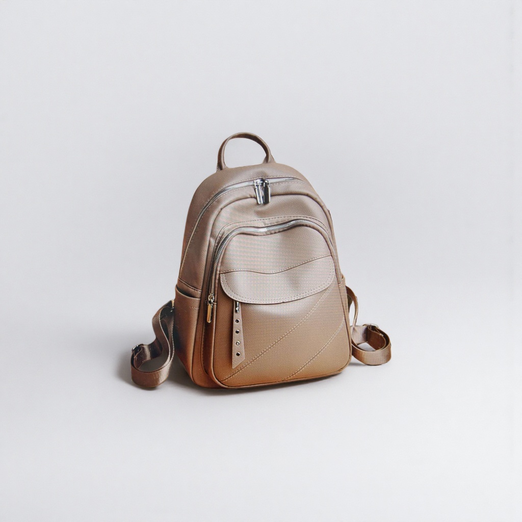 The beige leather backpack is simple and fashionable. It is a large-capacity, lightweight travel backpack for student commuting