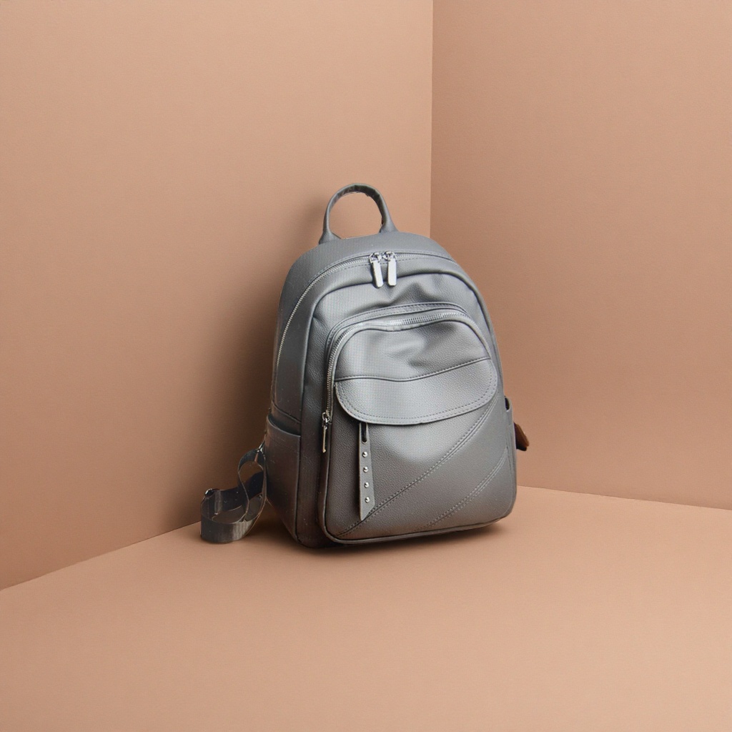 A simple, business-casual, large-capacity, lightweight student commuting backpack made of grey leather