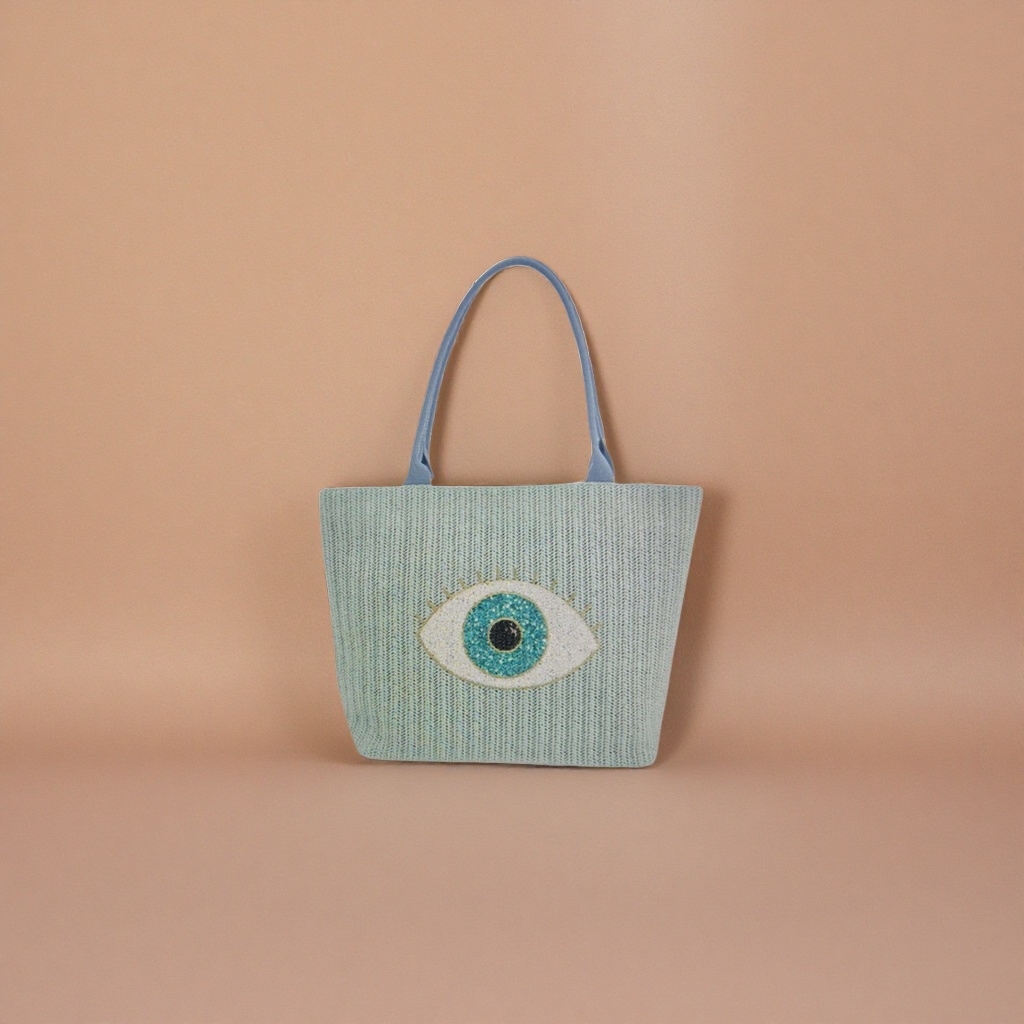 Light green woven bag with eye decoration, single-shoulder crossbody women's bag Application Scenario