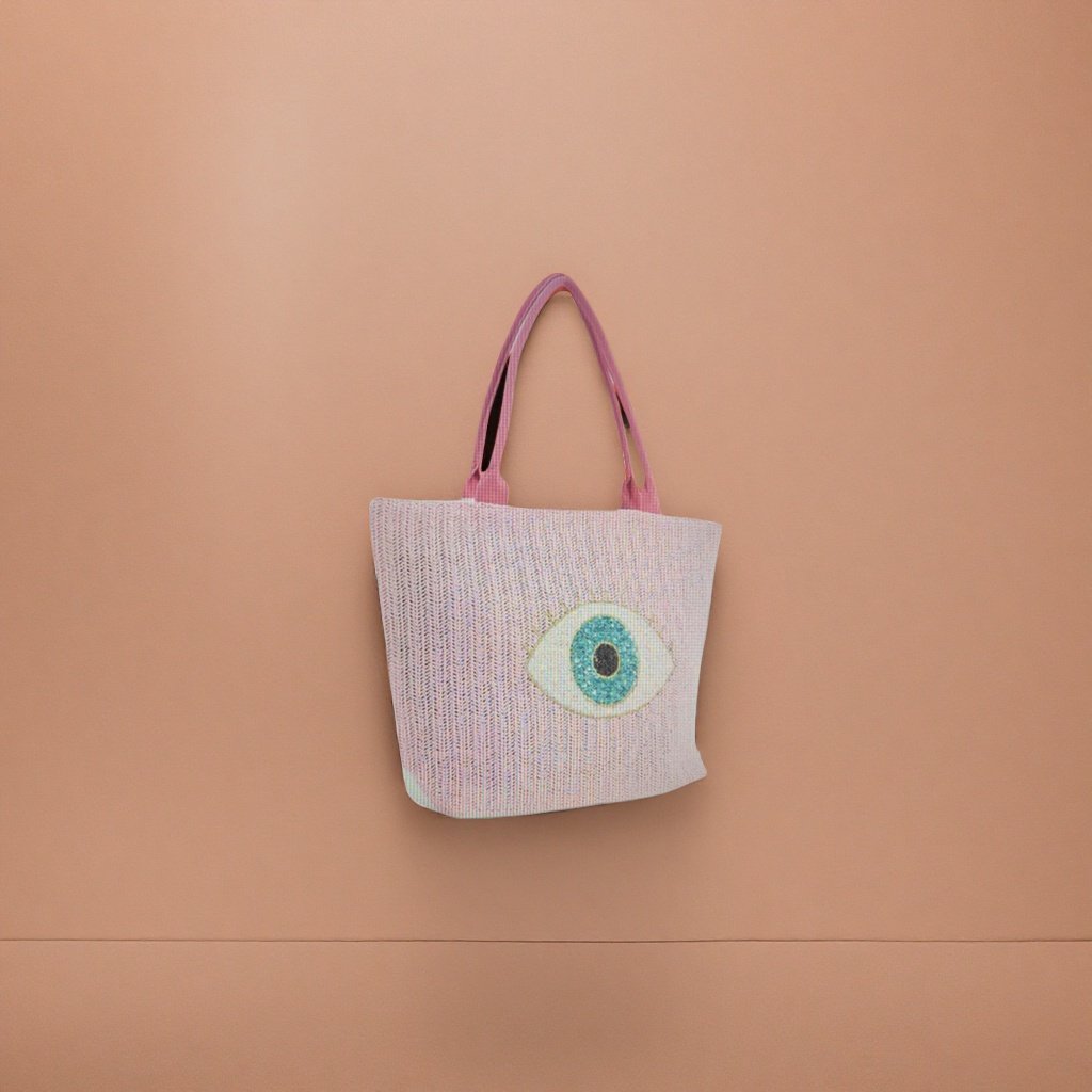 The front of the pink woven handbag features a blue sequined Devil's eye pattern Application Scenario