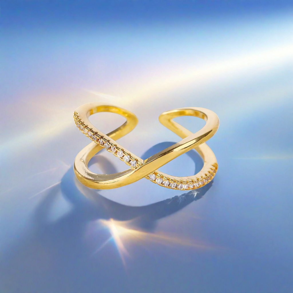 A simple and fashionable lady's ring with a golden cross set with small crystal stones details Picture