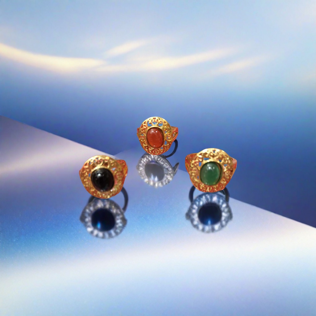 A fashionable and light luxury lady's ring with a golden carved pattern and a black oval gemstone set in the center Specification image