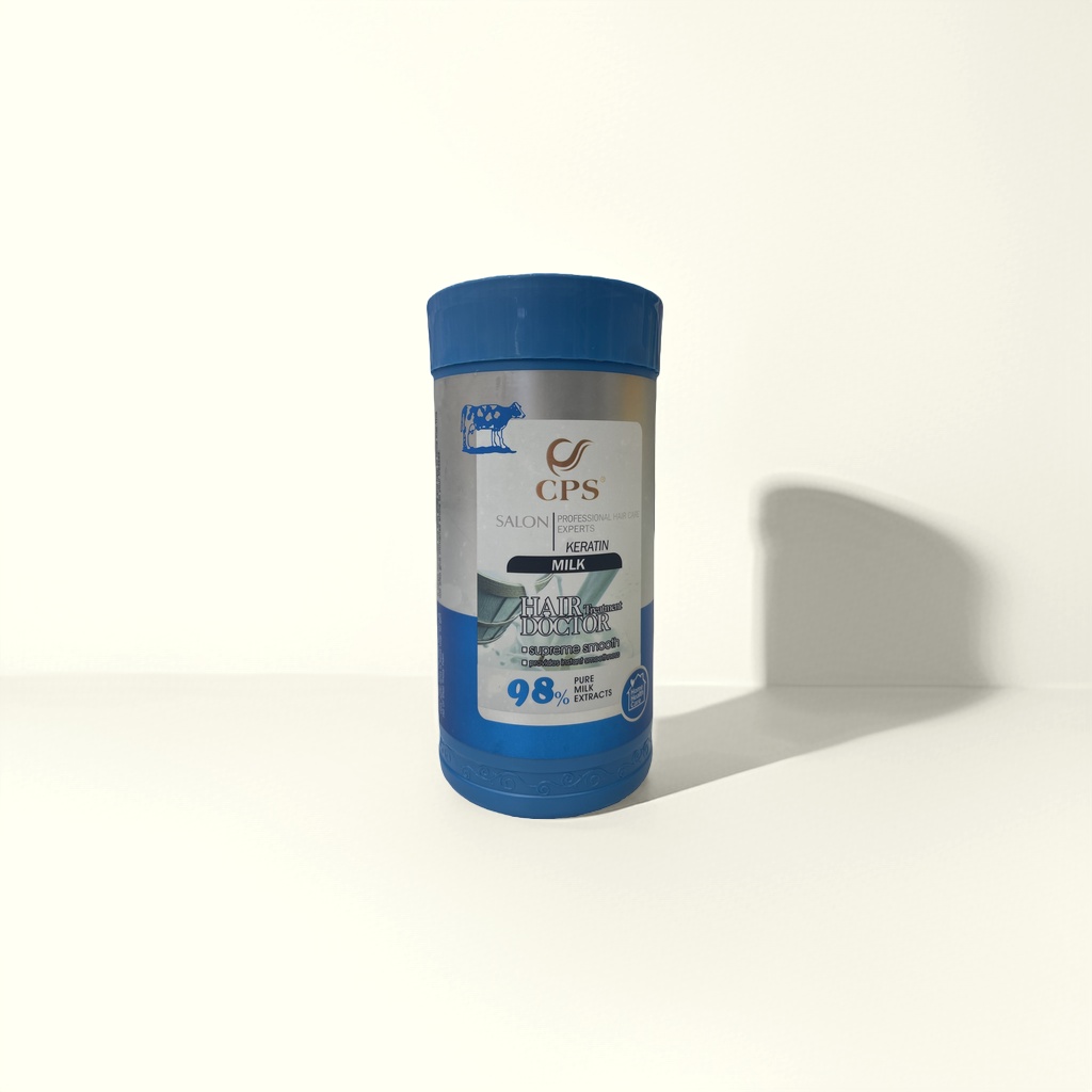 蓝色瓶身HAIR DOCTOR KERATIN MILK护发素98%纯乳提取奶牛图案
