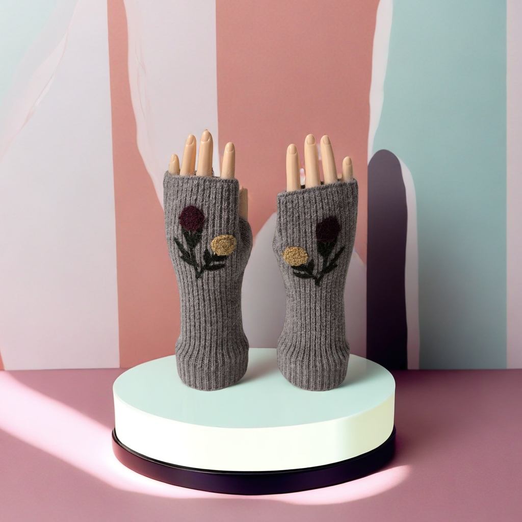 The wooden hand model of the grey knitted embroidered gloves showcases a pattern of four colors: dark grey, off-white, purple and black, red and yellow flowers and green leaves Specification image