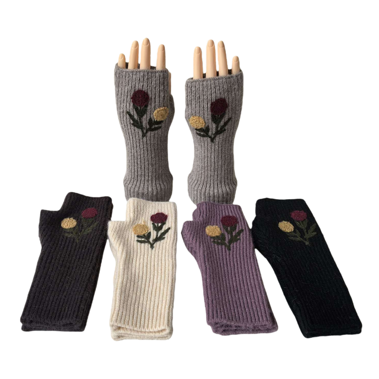 The wooden hand model of the grey knitted embroidered gloves showcases a pattern of four colors: dark grey, off-white, purple and black, red and yellow flowers and green leaves Item Picture