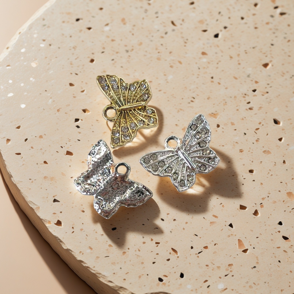 Gold and silver butterfly-shaped crystal stone inlaid perforated jewelry details Picture