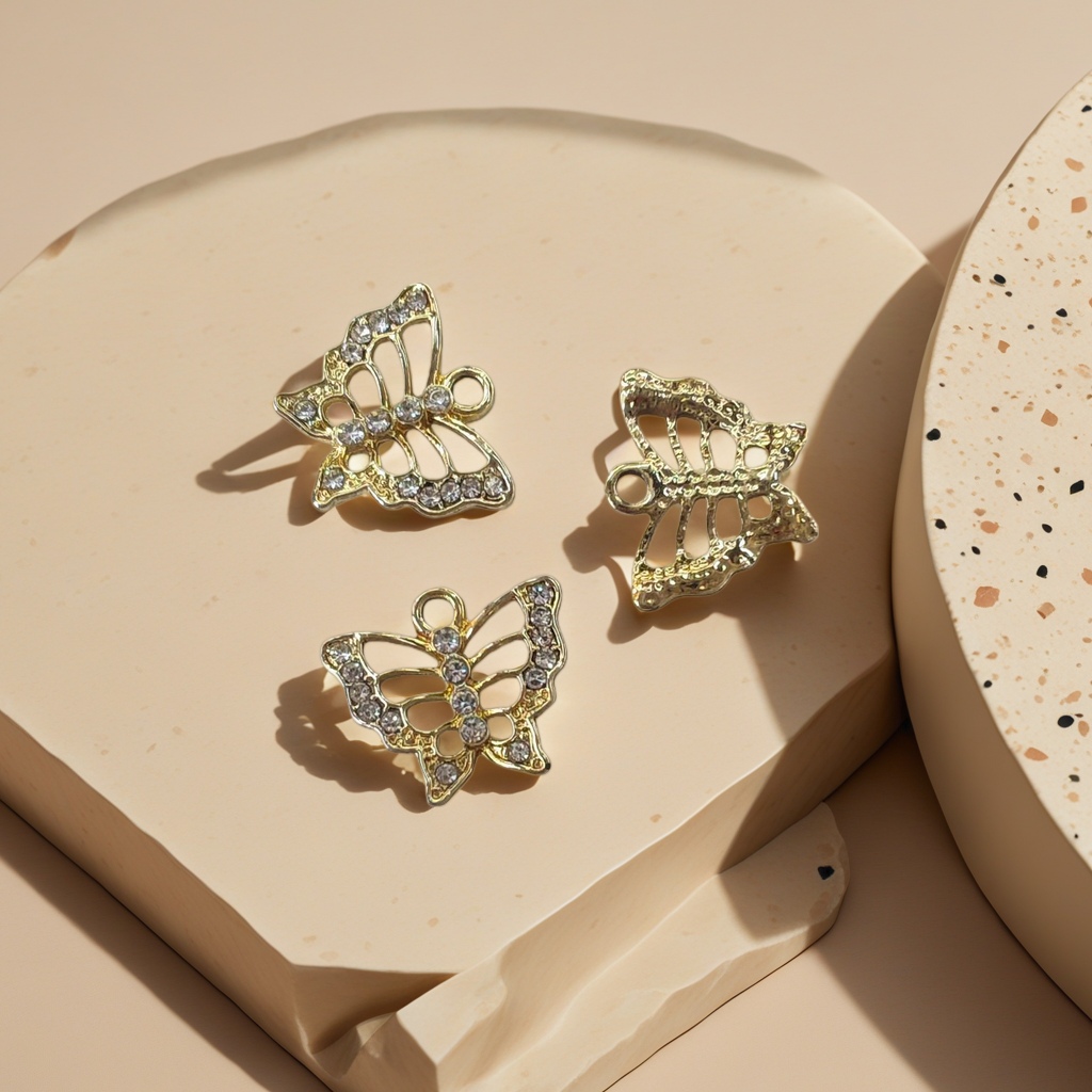 Golden butterfly-shaped jewelry inlaid with crystal embellishments