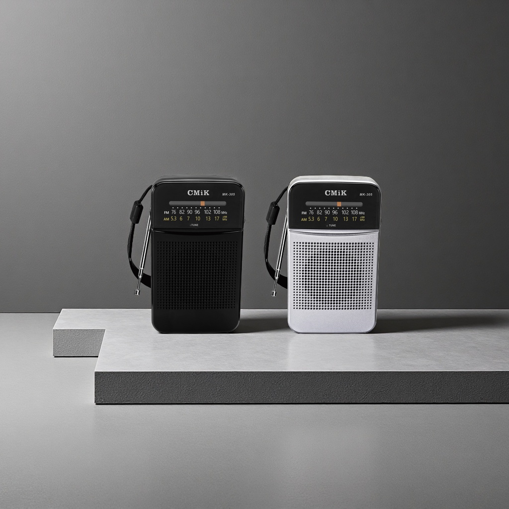 Black and silver portable radio, AMFM dual-band digital display, battery-powered