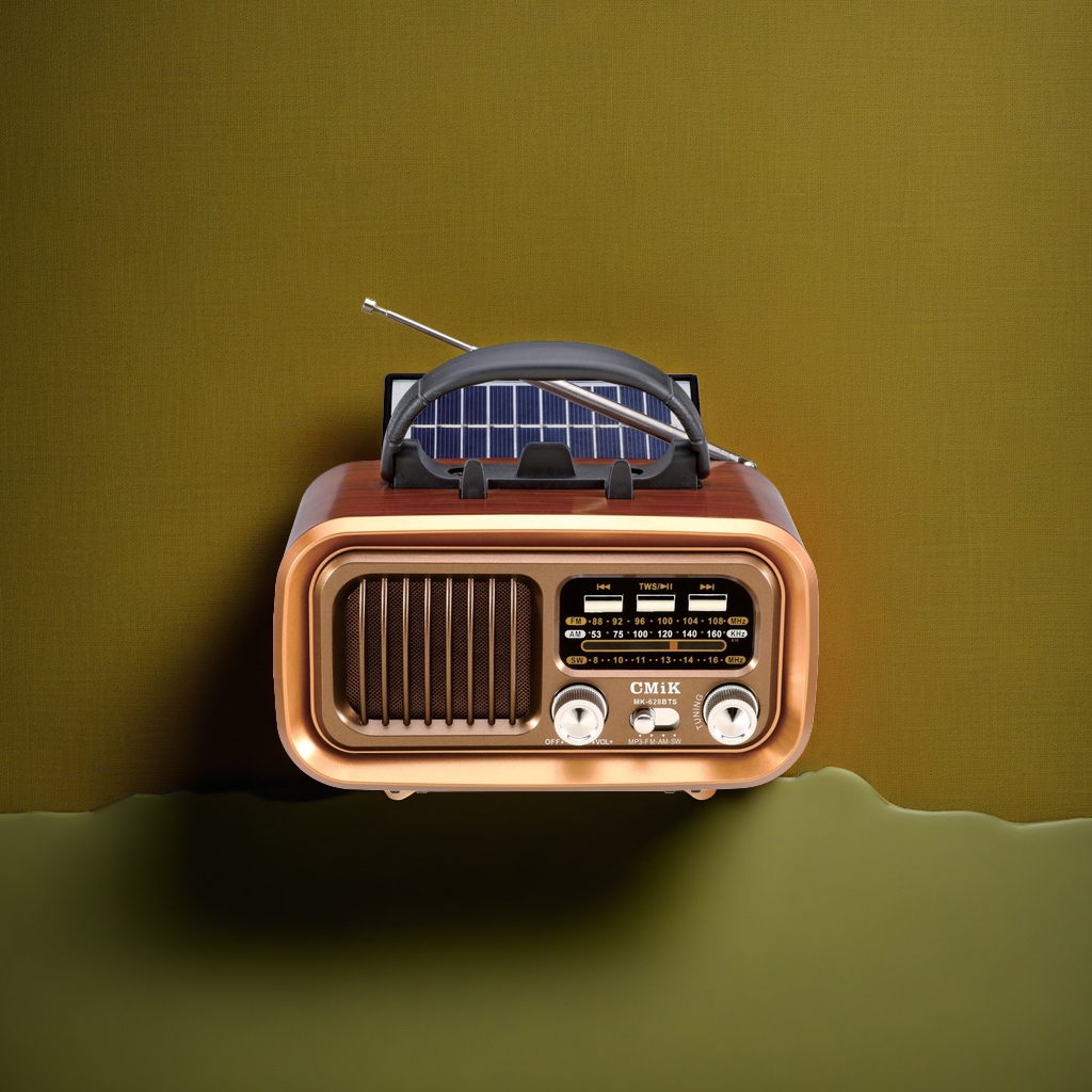 Brown vintage portable radio with solar panel and antenna, an old-fashioned rechargeable outdoor radio