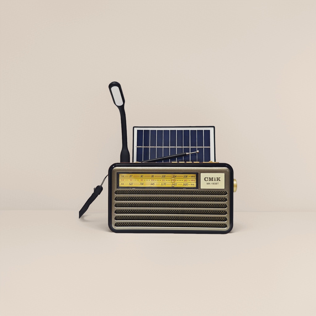 A golden vintage radio with solar panels and LED lights, integrating radio reception, playback and lighting details Picture