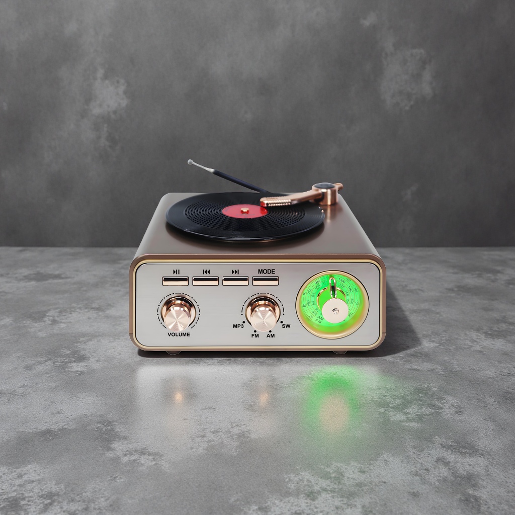 Retro black and gold color audio equipment with a green tuning knob for the turntable
