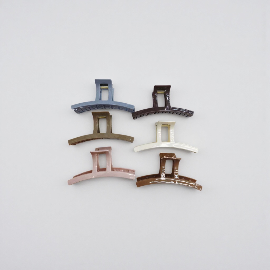 A set of six colorful hairpins with white striped trays for display Application Scenario