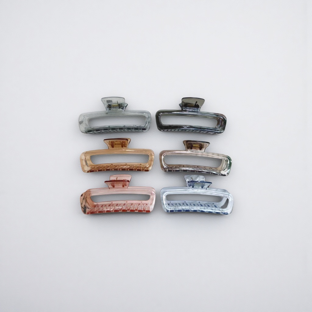 A six-color transparent plastic gripper set is displayed on a white striped tray Application Scenario