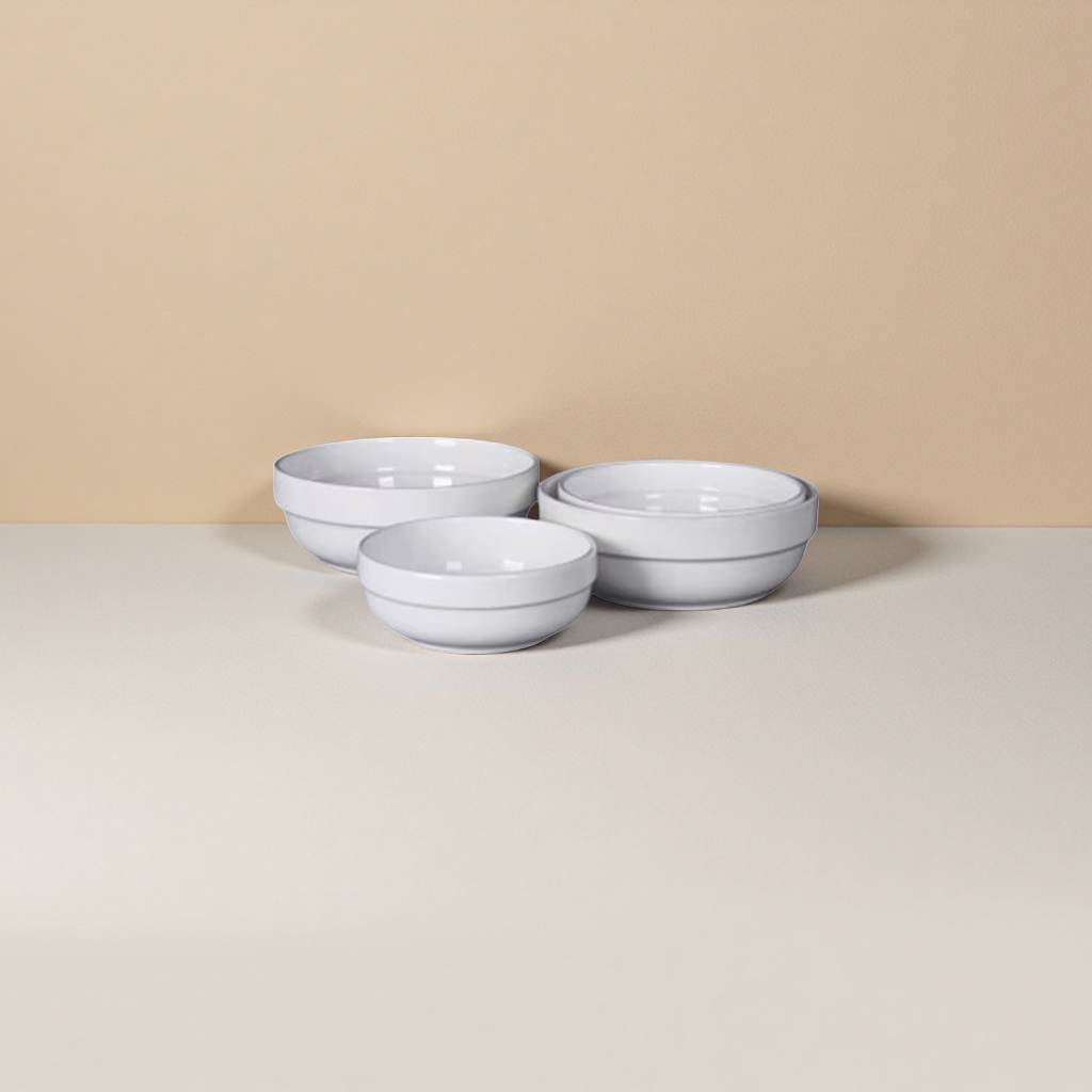 The white edge guard bowl is a household ceramic tableware with a simple Nordic style and heat-resistant edge design details Picture