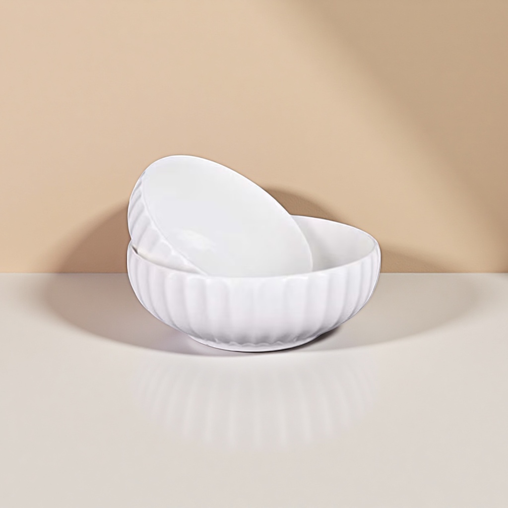 The white ceramic bowl is a simple household dining bowl with a high-temperature resistant glaze that is smooth and easy to clean Application Scenario