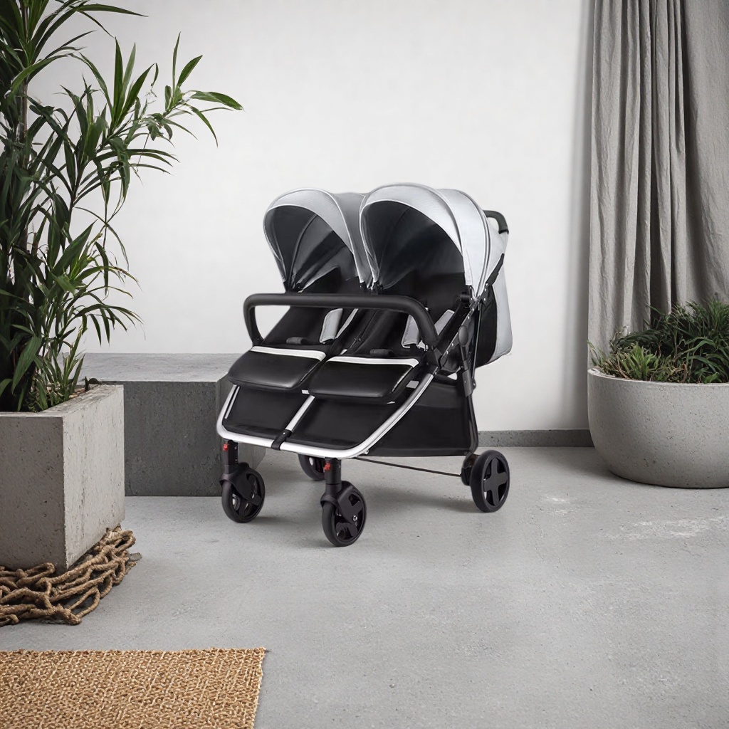 The silver and black twin baby stroller can be used for sitting or lying down, and can be pushed in both directions with light folding details Picture