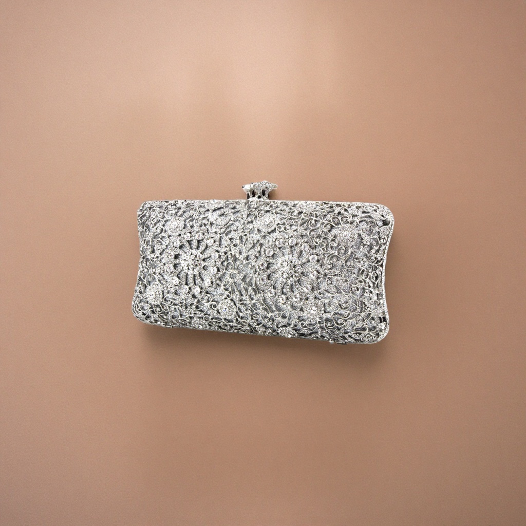 The silver diamond-encrusted and carved clutch is small and portable for ladies' dinner parties details Picture