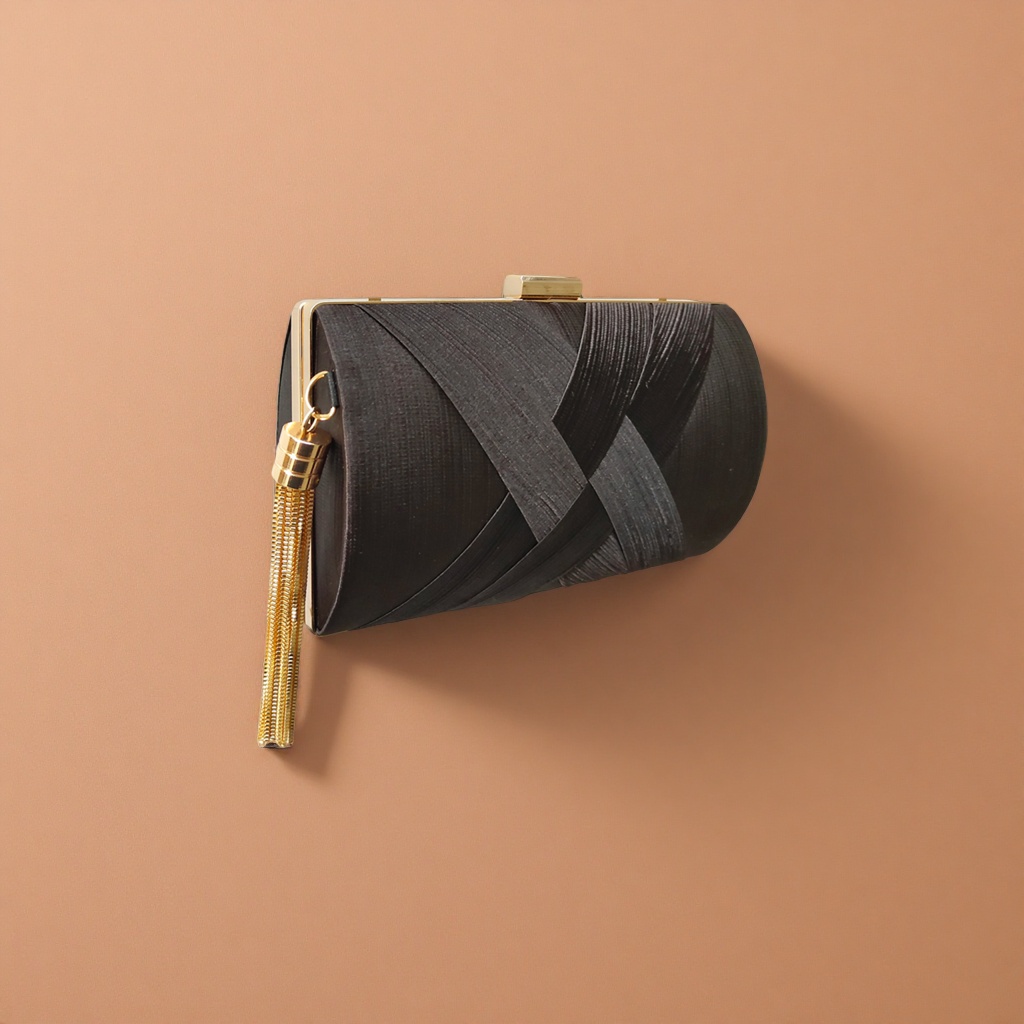 Black pleated clutch with golden metal buckles and tassels details Picture