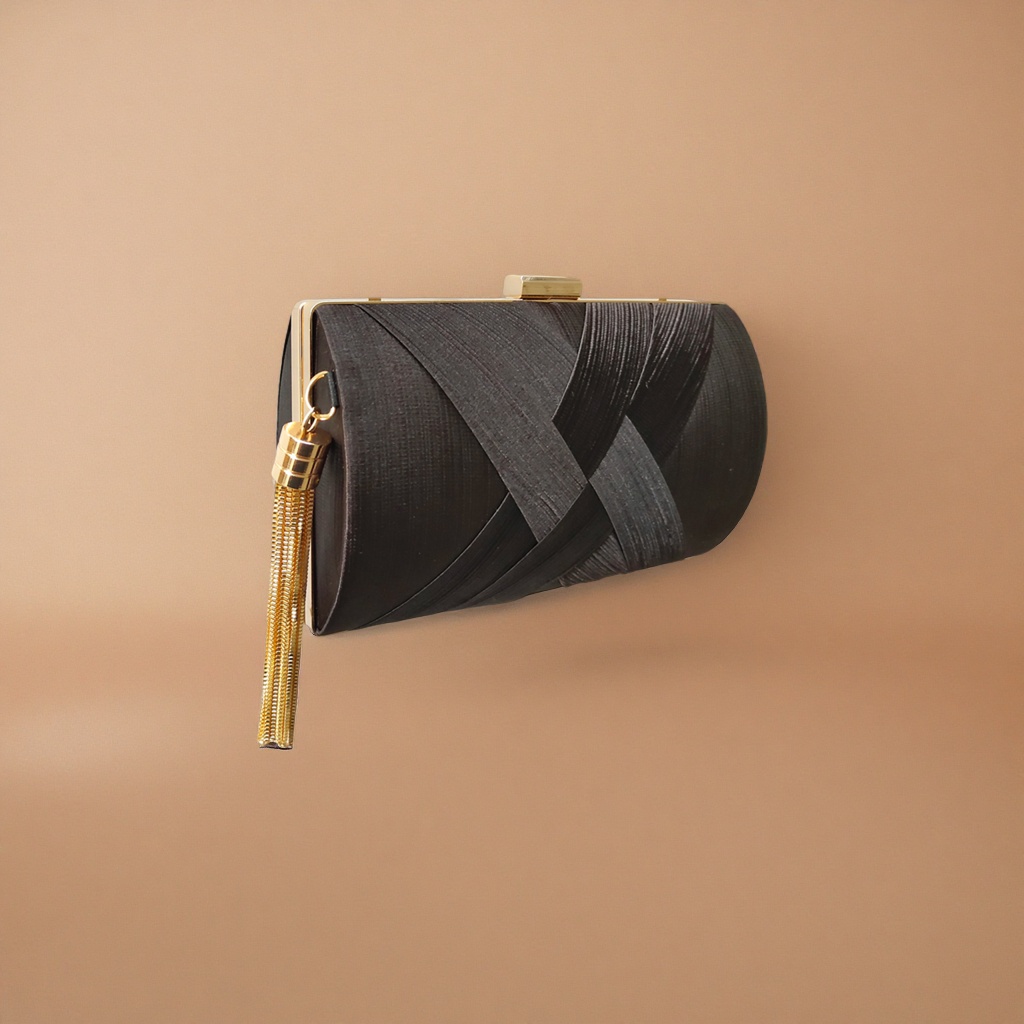Black pleated clutch with golden metal buckles and tassels Application Scenario
