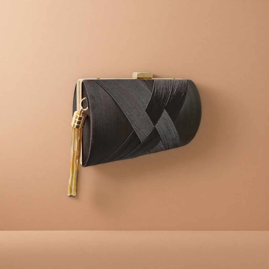 Black pleated clutch with golden metal buckles and tassels