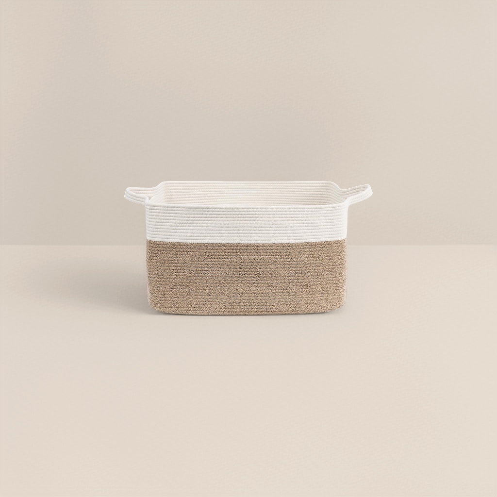A dual-color woven storage basket in off-white and mottled brown for home use in the living room and bedroom