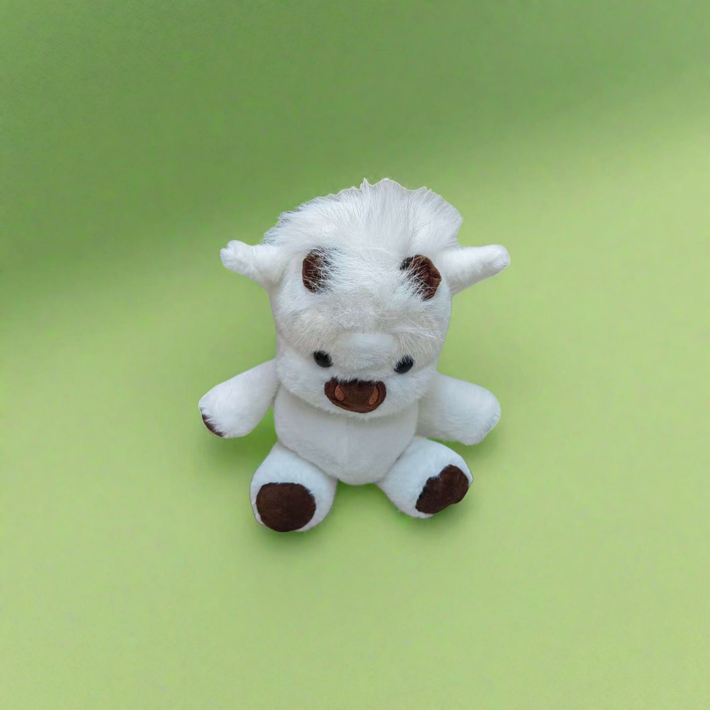 The white plush cow doll is a cute and soft fabric decoration item and a plush toy for home decoration Specification image