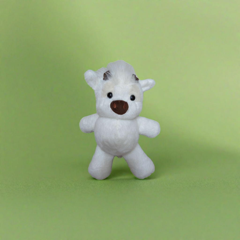 The white plush cow doll is a cute and soft fabric decoration item and a plush toy for home decoration details Picture