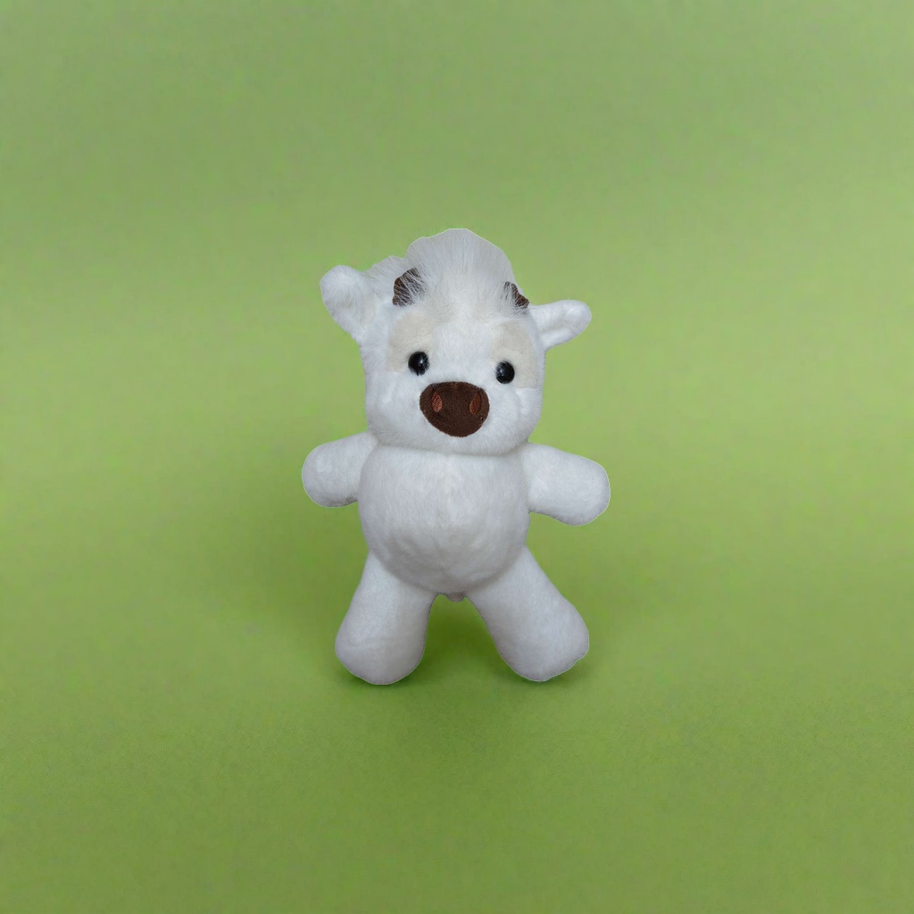 The white plush cow doll is a cute and soft fabric decoration item and a plush toy for home decoration