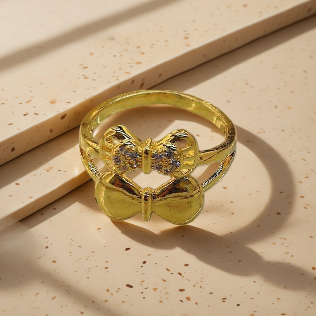 A golden bow-shaped ring is a fashionable and simple ladies' accessory Application Scenario