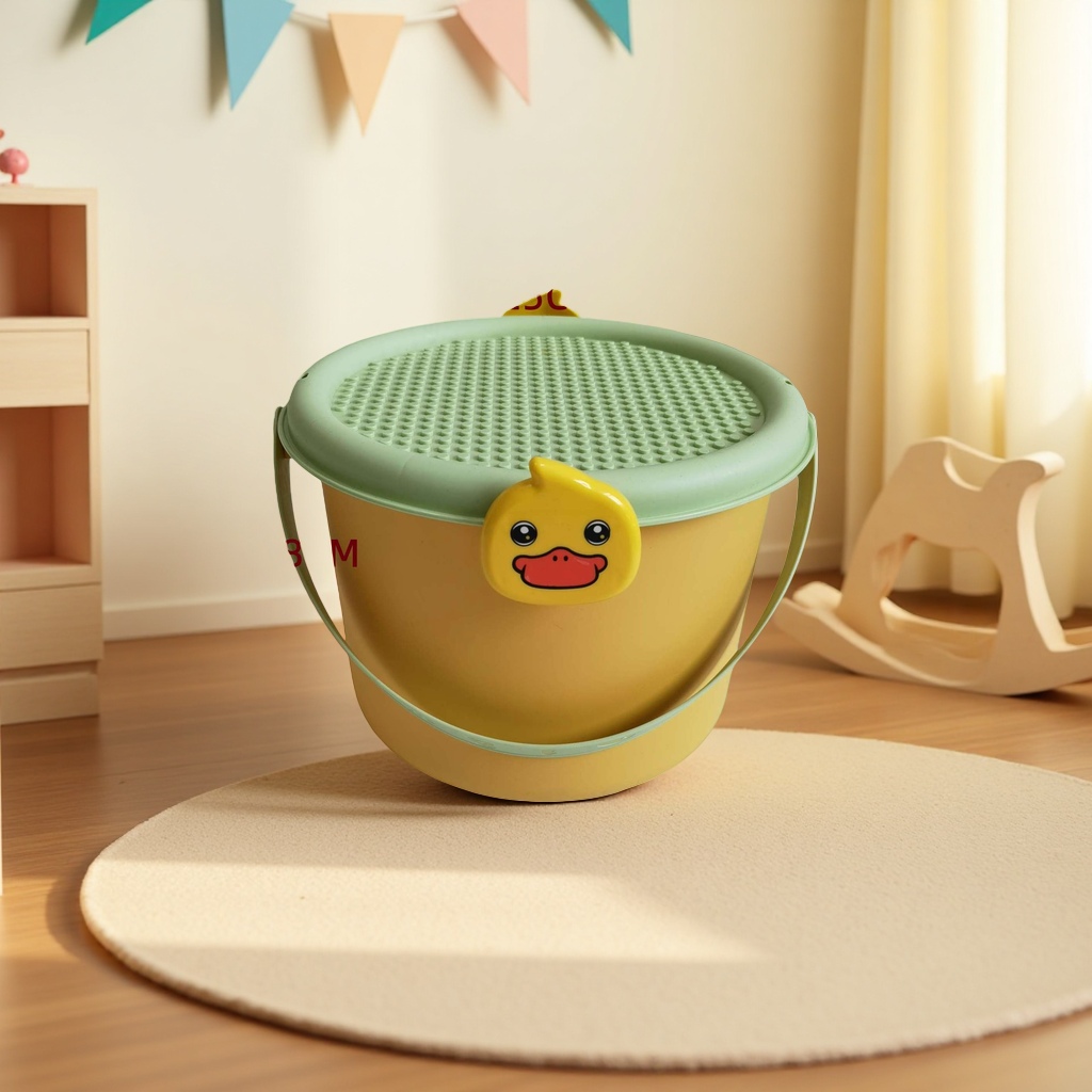 Yellow duck-shaped plastic bucket with light green lid handle and raised dot texture on the lid surface details Picture