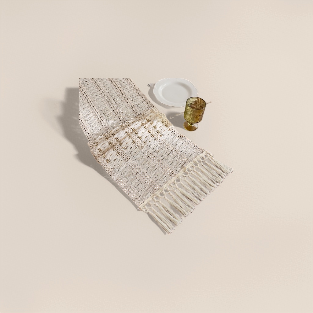 The off-white crocheted table flag is decorated with tassels
