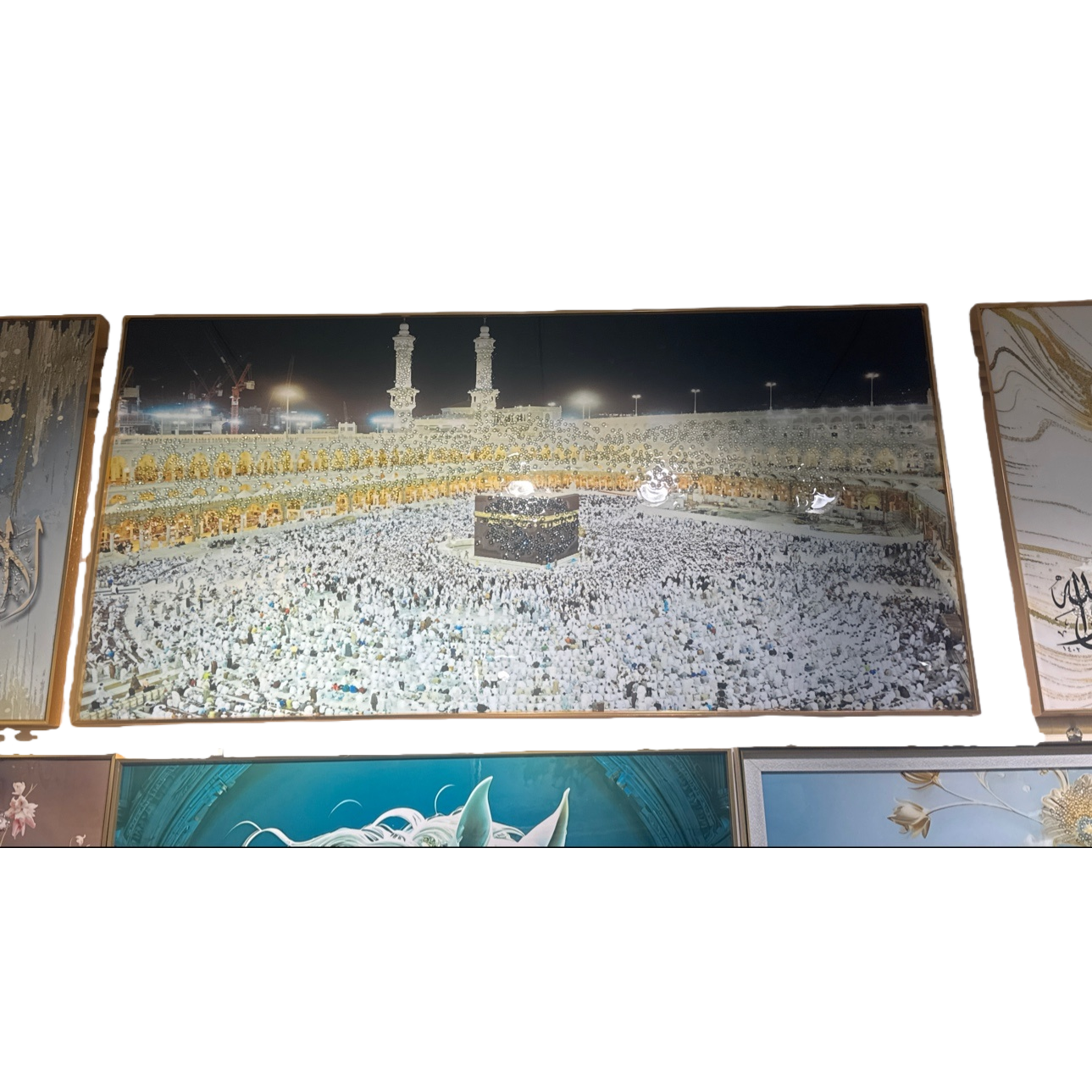 A painting of the Hajj crowd at the Kaaba Mosque in Mecca with golden borders Item Picture