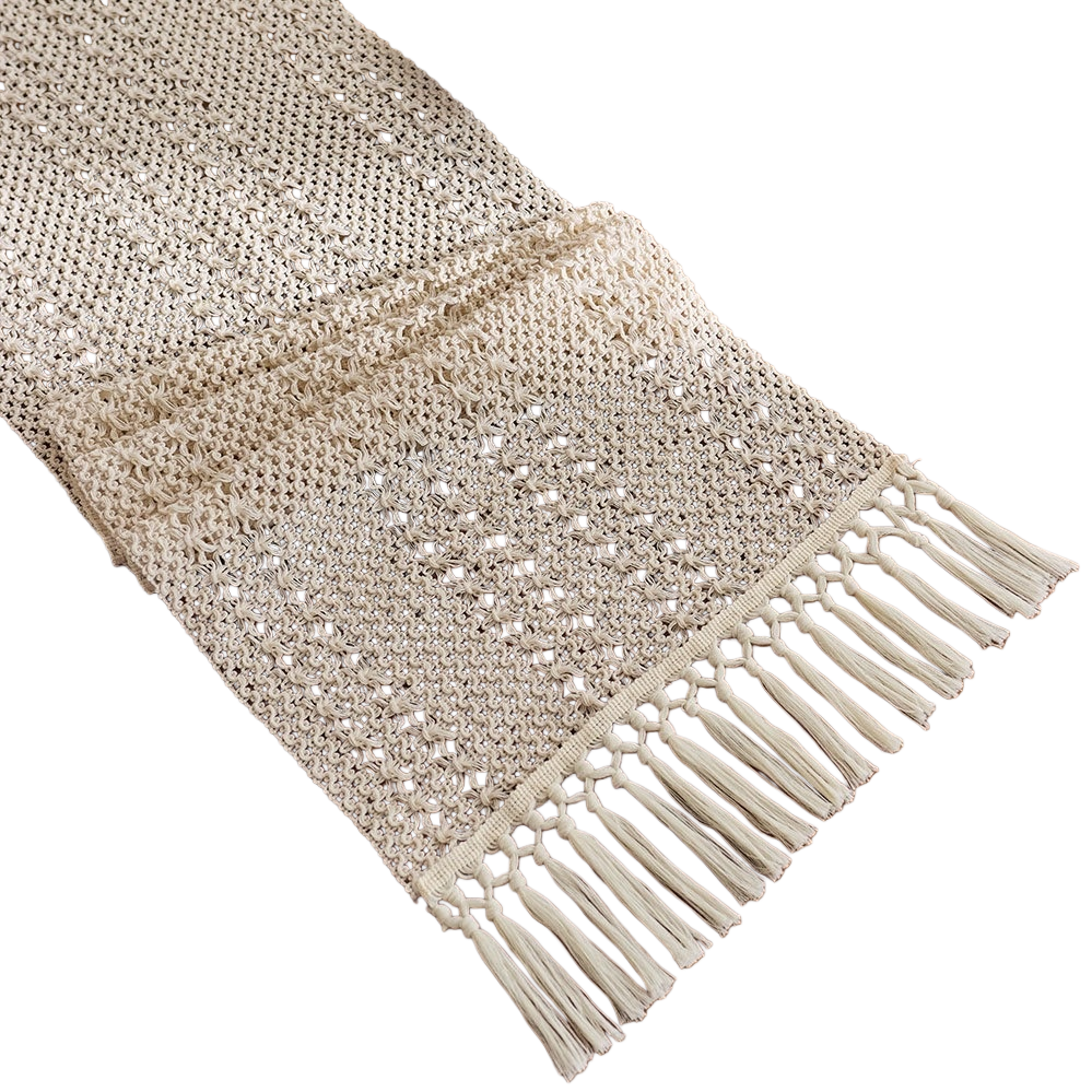 The off-white crochet table flag is fringed with tassels Item Picture