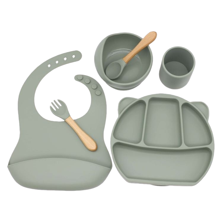 Green silicone baby tableware set with bibs, compartments, plates, bowls, cups, wooden handles, forks and spoons Item Picture