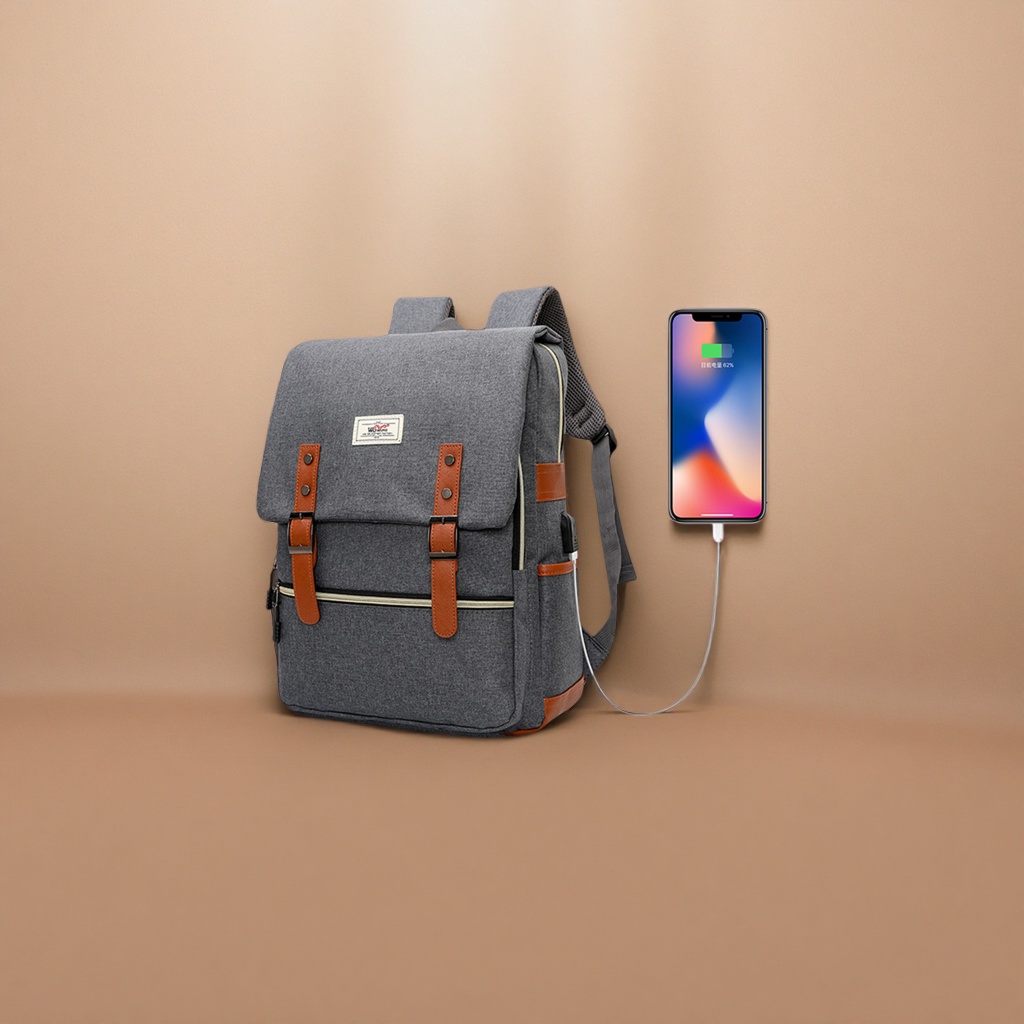 A grey backpack with brown leather trim and a USB charging port for mobile phone charging Specification image