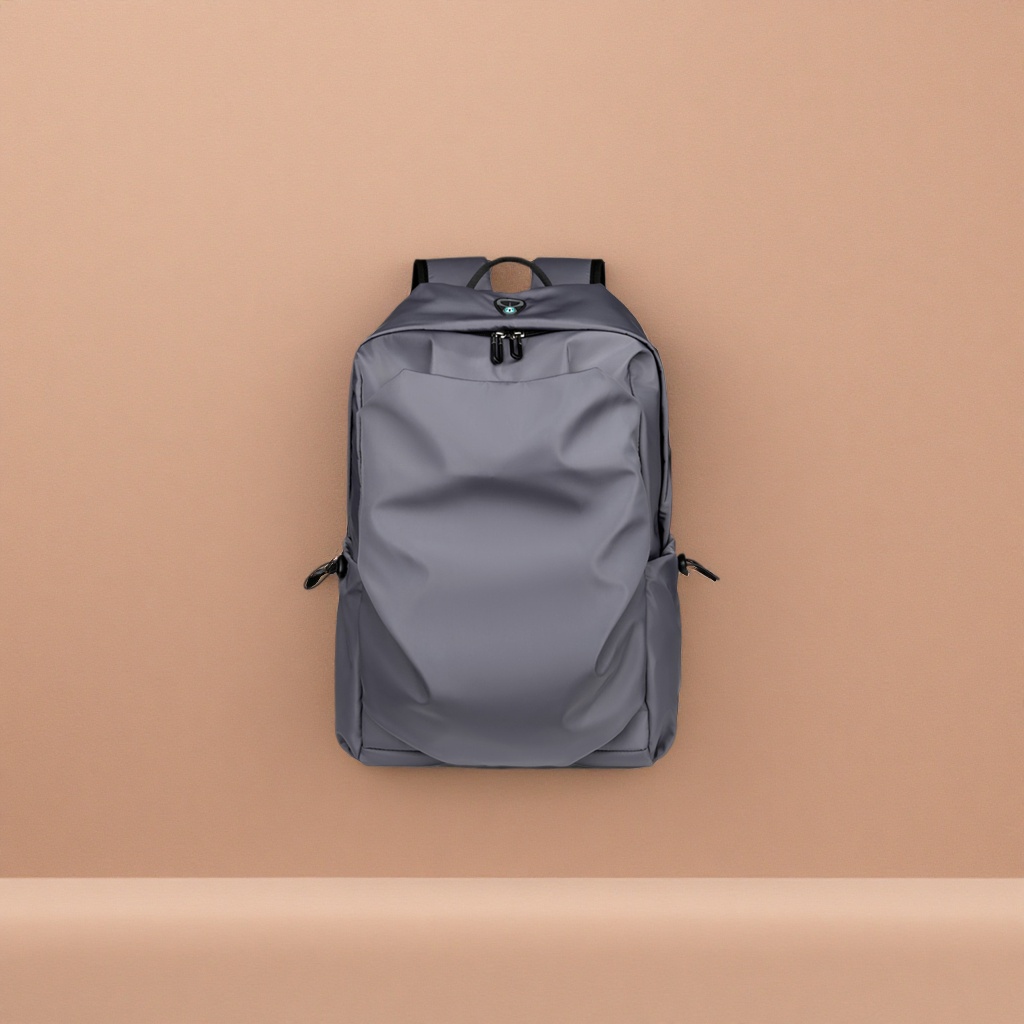 This grey, simple and fashionable casual backpack is suitable for both men and women, with a large capacity and is lightweight for travel and commuting