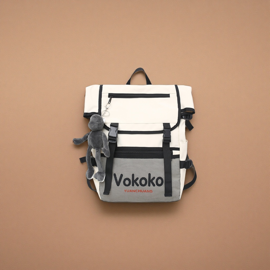 The front of the off-white backpack features a mesh bag printed with "Vokoko YUANCHUANG", and it comes with a black zipper and a gray plush keychain hanging on the left details Picture