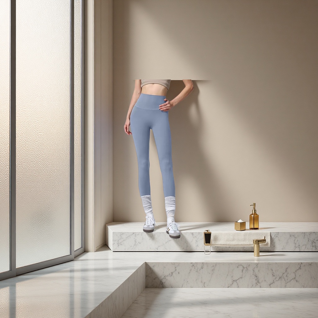 A woman wearing light blue high-waisted tight pants paired with white long socks and sports shoes can make her legs look longer