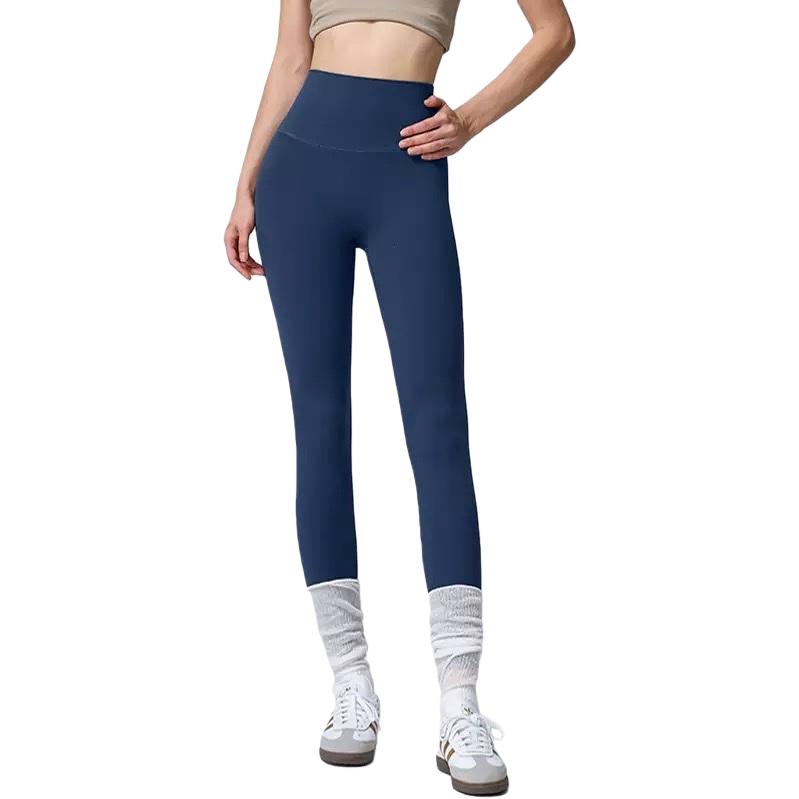 Dark blue high-waisted tight pants for women paired with white long socks and sports shoes make them look slimmer and more form-fitting Item Picture
