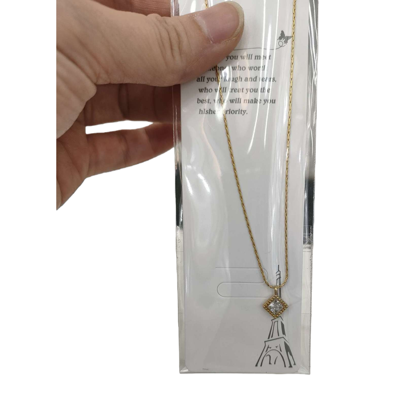 A golden necklace with a pendant is a fashionable, simple and versatile women's accessory Item Picture