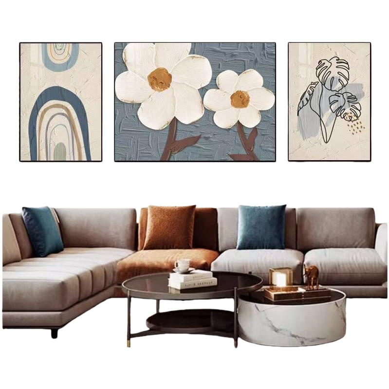 A modern and simple living room hanging picture set featuring three decorative paintings paired with a sofa Item Picture