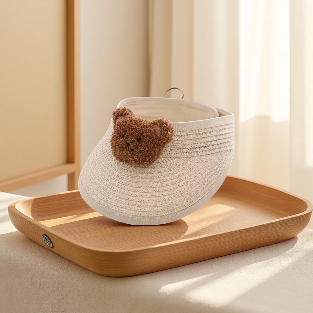 A beige straw-woven sun hat paired with a brown bear plush decorated summer sun protection hat Application Scenario