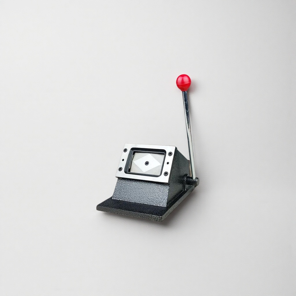 Black base, red handle punching machine, manual hole puncher, office stationery details Picture