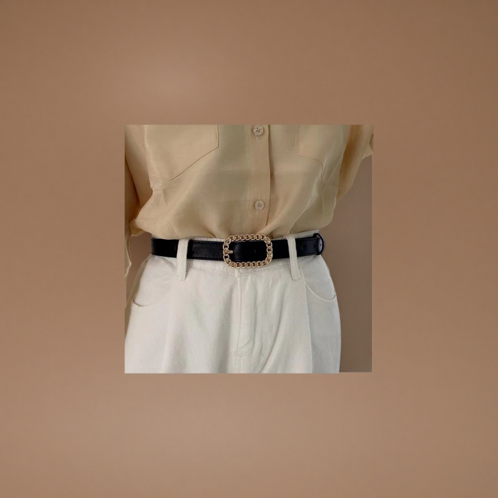 A simple and versatile men's leather belt with a black belt and golden chain buckle details Picture