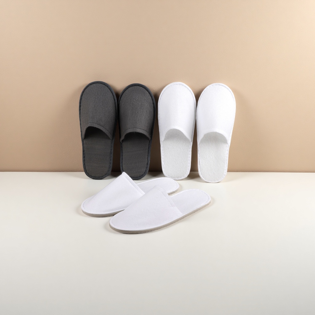 Grey and white disposable hotel slippers for both men and women, made of anti-slip cotton and comfortable disposable details Picture