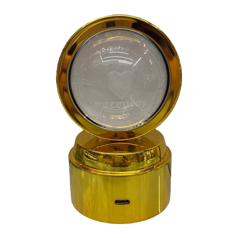 The golden base and transparent sphere are engraved with heart-shaped patterns and the words "everyday" Item Picture