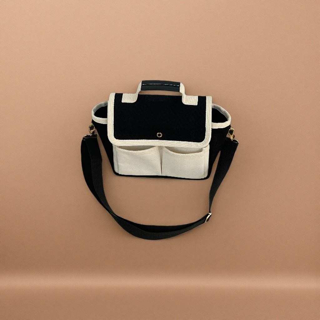 Black and white color-blocked canvas bag, fashionable and versatile, large-capacity commuter hand-held shoulder bag