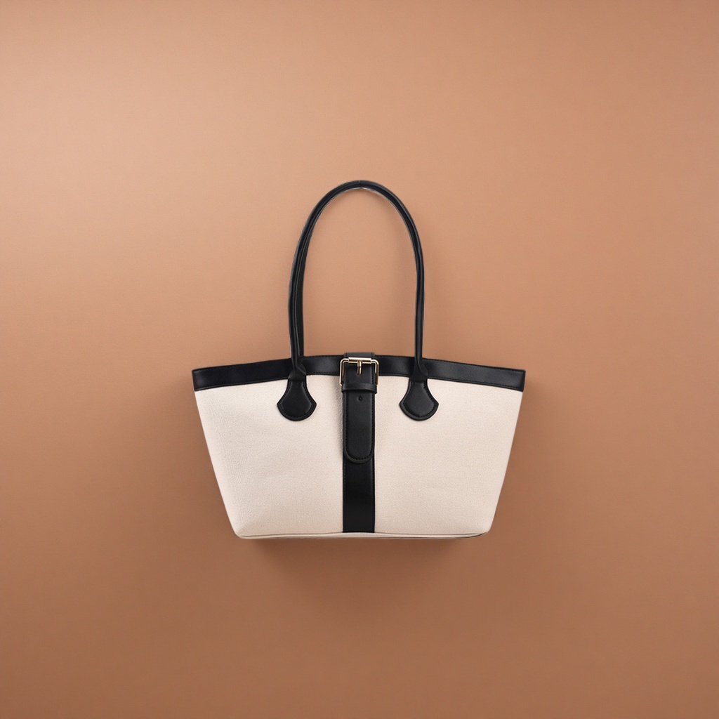 A casual single-shoulder bag in off-white canvas with a black leather handle decorative strap Specification image