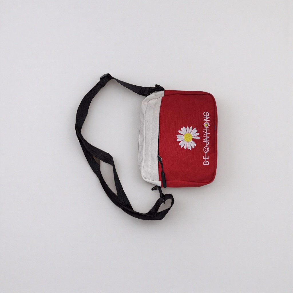Red and white crossbody bag with white Daisy embroidery BE@JNYI NG and black adjustable shoulder strap Application Scenario